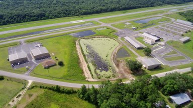 Commercial hangars and FBO looking east